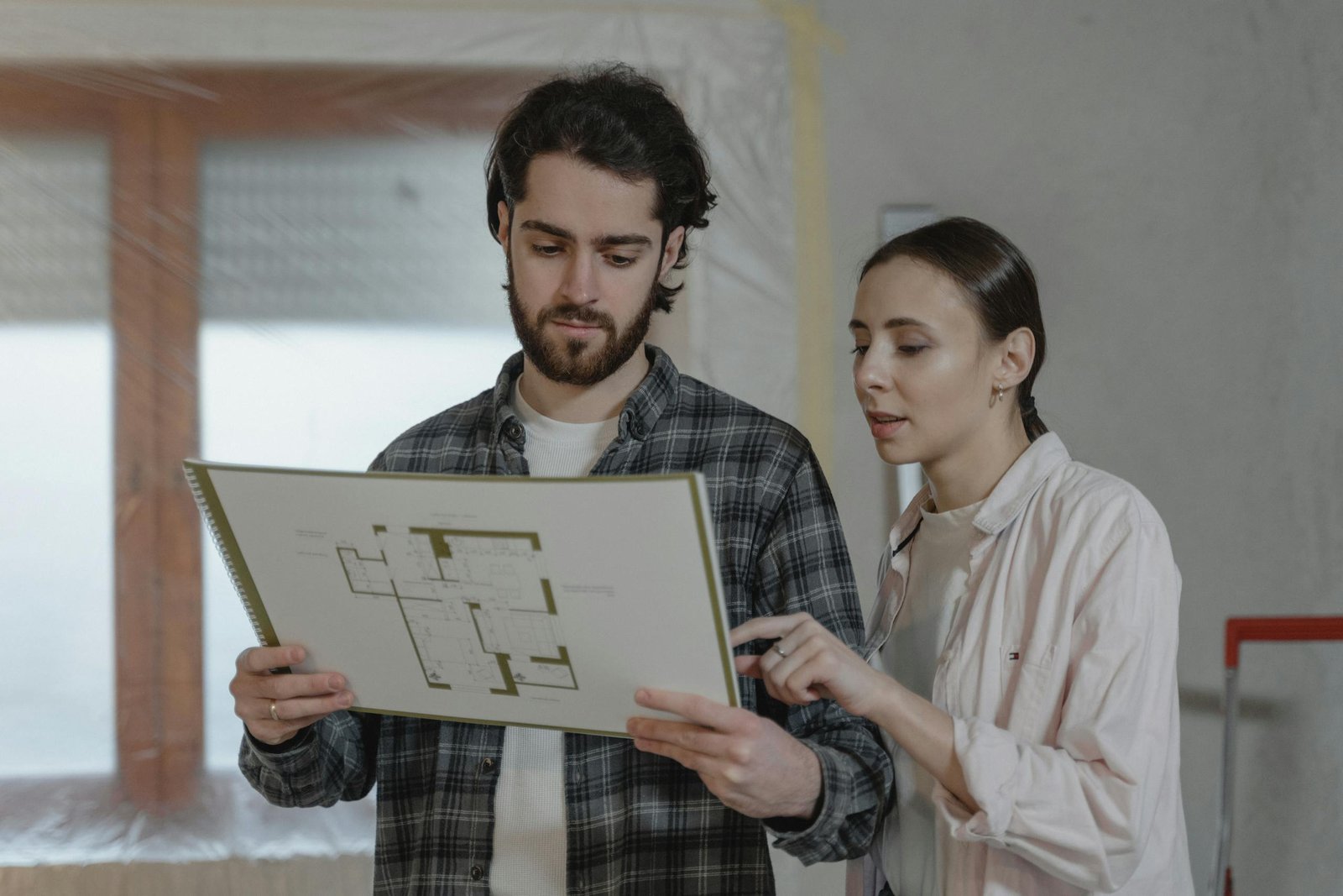 a man and woman doing inspection